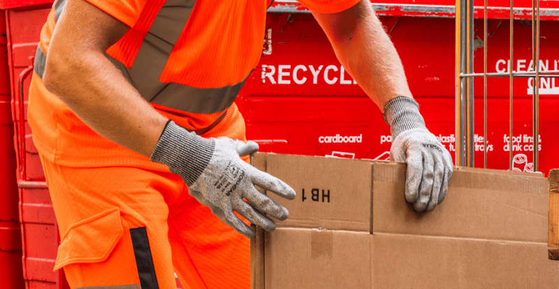 Waste working wearing ROKWEAR® safety gloves.